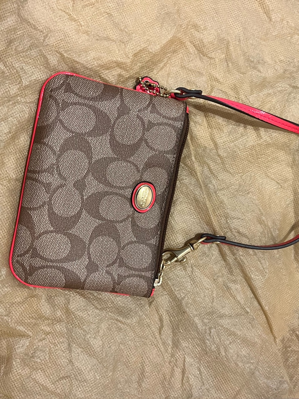Coach Brown Signature Canvas Wristlet  with Orangey-Pink Trim